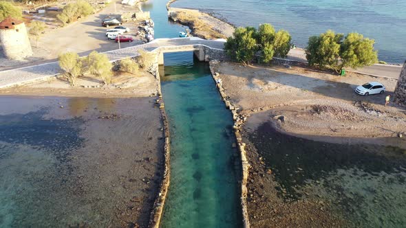 Aerial View of a Motor Boat in a Deep Blue Colored Sea. Kolokitha Island, Crete, Greece