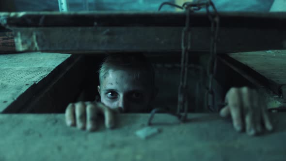 Prisoner The Kidnapped Man Dirty and Fearful In Torn Clothes alt