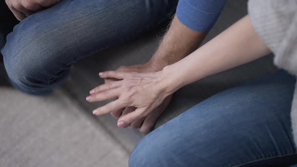 Top View Wife Touching Hand of Husband As Man Pushing Away Woman Palm alt