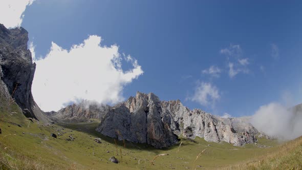Time Lapse of Clouds Over Mountain Tops