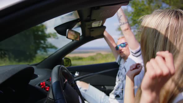 Young Couple Riding A Car On, Stock Footage | VideoHive