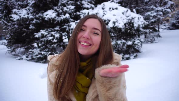 Pretty Girl Posing for Camera Winter Snow