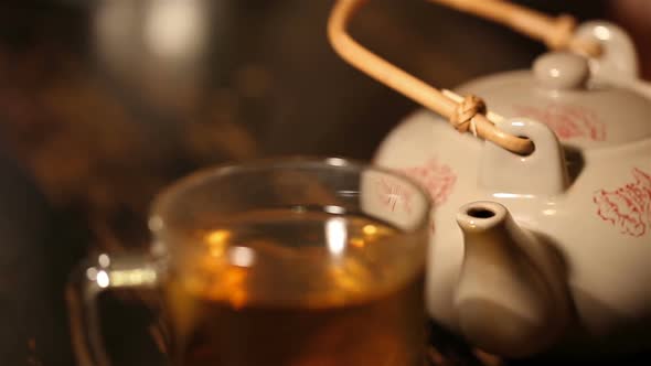 Macro of Transparent Teacup With Hot Herbal Tea