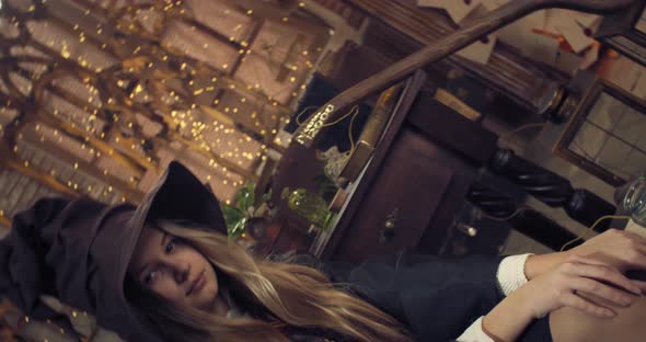 Rotating Shot of a Young Student of the Wizard School in a Hat Portrait alt