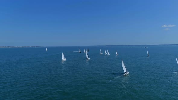 Summer Sailing Regatta at Sea Aerial View alt