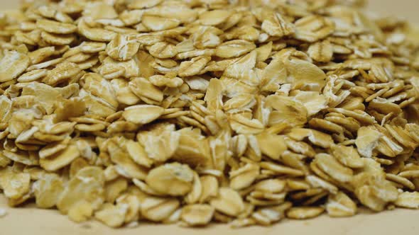 Spinning Oatmeal Close-up. Concept of Healthy Nutrition and Production of Natural Products alt
