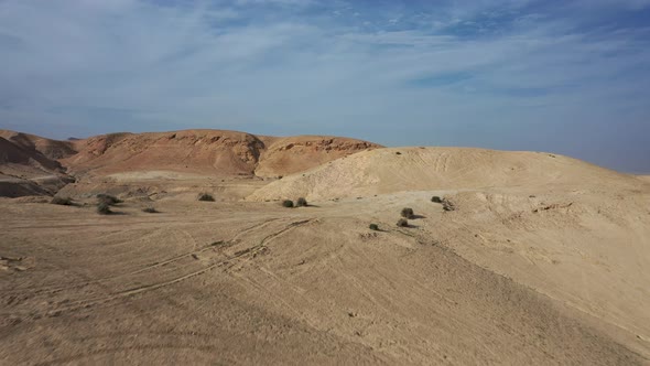 fly over yellow and red hills in the Judean Desert, Israel, Drone shot alt