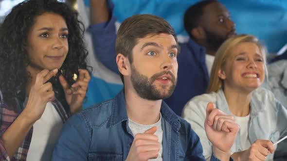 Supporters With Argentinian Flag Disappointed About National Team Losing Match alt
