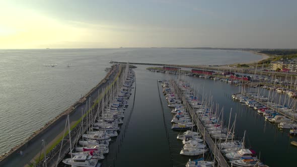 Aircraft diving in between sailboats, Lomma Sweden alt