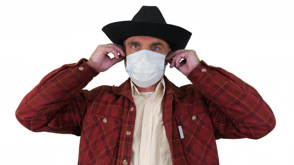 Farmer Taking Off Medical Mask and Taking a Deep Breath Coronovirus Pandemic Is Over on White alt