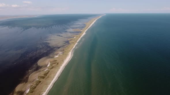 Aerial Shot of an Upright Sand Spit at the Black Sea Shallow in Sunny Summer