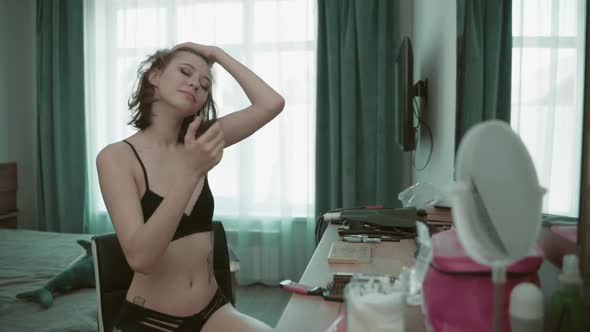 Young Beautiful Brunette Woman In Lingerie At Home Bedroom Mirror alt