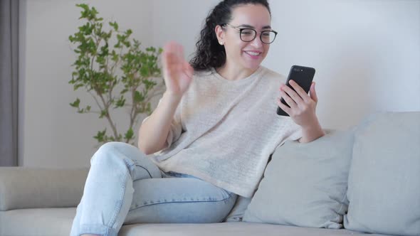 Happy Young Woman Freelancer Look at Camera Talk Do Live Video Conferencing Online with Work. Girl alt