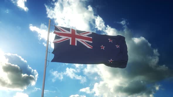 Flag of New Zealand Waving at Wind Against Beautiful Blue Sky alt