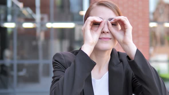 Binocular Gesture by Young Businesswoman alt
