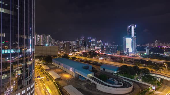 Aerial View of Busy Traffic Night in Finance Urban Timelapse Hyperlapse with Panorama of City alt