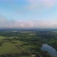Smooth and Fast Flight Over the Lake and the Village - VideoHive Item for Sale