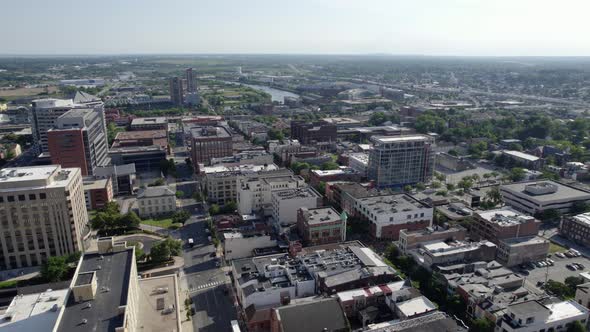 Aerial view overlooking the Wilmington cityscape, summer in Delaware, USA - pan, drone shot alt