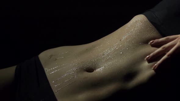 Closeup of Wet Belly of Sexy Girl in Underwear alt