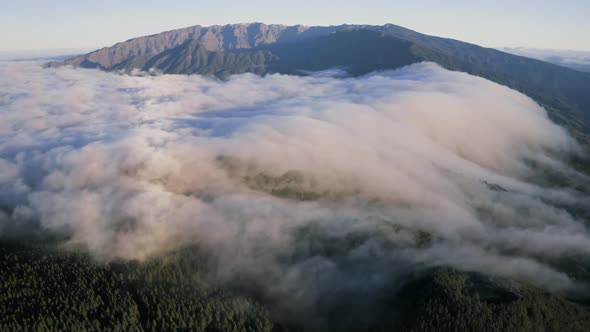 Aerial View Of Sea Of Clouds Coverage Over Caldera de Taburiente National Park in La Palma island