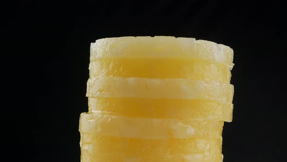 Sliced pineapple. Canned fruits. Macro