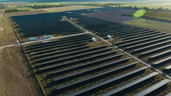 Aerial Shot of a Solar Power Station with Mirror Panel Collecting Energy in Ukraine 
