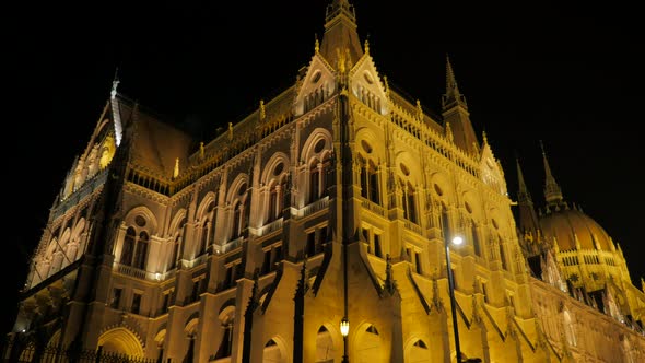 Parliament of Budapest facades by the night lights  slow tilting 4K 2160p UltraHD footage - Art of a alt