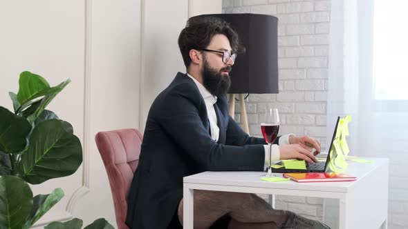 Bearded Man with No Pants Close the Computer and Enjoy a Glass of Wine alt