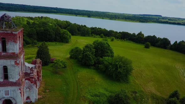 Tractor Working on the Island in Summer Aeroview