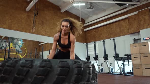  Pushing big tire. alt