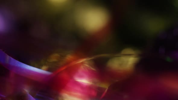 Rotating shot of colorful Easter candies on a bed of easter grass - EASTER 256 alt