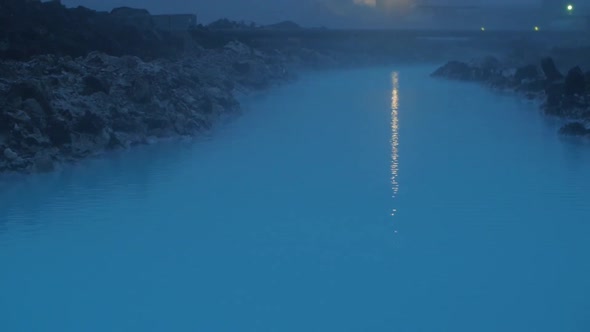 iceland, blue lagoon, Svartsengi geothermal power station at night, camera movement, camera tilt up, alt