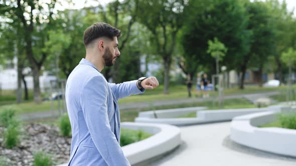 Male Checking Pulse Smartwatch App alt