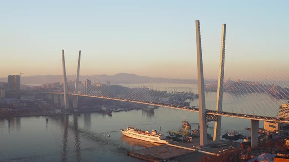 Beautiful Autumn Top View of Cablestayed Bridge with Hills at Sunrise alt