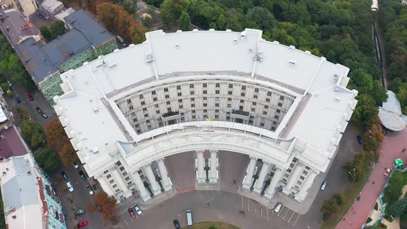 Building of the Ministry of Foreign Affairs of Ukraine with a Waving Flag on Top. Top View. Overall alt