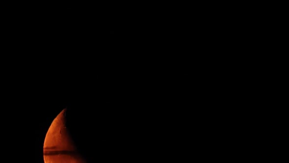 Moonrise in Dark Sky with Clouds alt