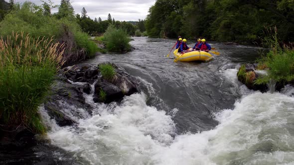 Aerial shot of people white water rafting on Rouge River, Oregon