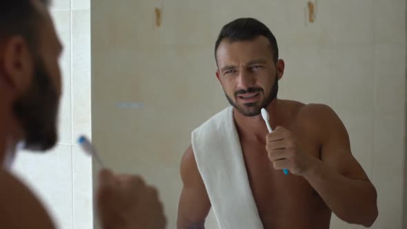 Carefree Man Singing With Toothbrush Like Microphone, Shattered Dreams, Hobby alt