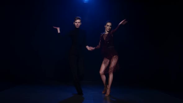 Contemporary Dancing Pair of Professional Elegant Dancers in Smoky Studio alt