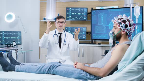 Patient Sitting on a Bed in a Facility for Brain Research alt