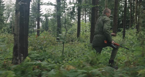 Millitary Action in Dense Forest Running After Terrorist Concept of War and Terrorism alt