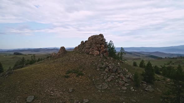 Baikal Valley spirits,Tazheran Steppe, Stone Cliffs on the Road, Aerial Summer alt