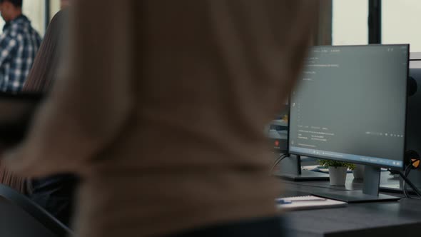 Freelancer Software Programer in Video Call Conference with Project Owner Discussing Coding Deadline alt