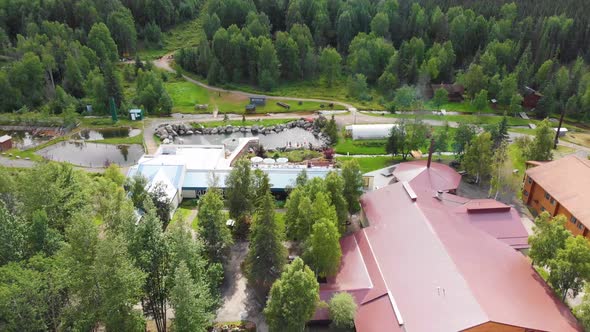 4K Drone Video of Chena Hot Springs Resort near Fairbanks, Alaska in Summer alt