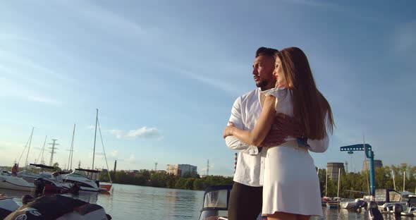 Romantic Couple Having Date on Embankment at Sunset