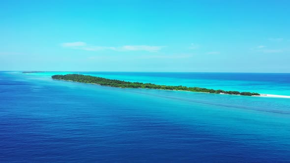 Aerial drone view travel of idyllic lagoon beach break by blue green water and white sandy backgroun alt