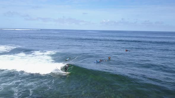 A View From Above of the Surfers in the Ocean