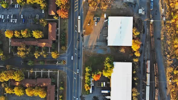 Autumn landscape aerial view of train on along beautiful railroad alt