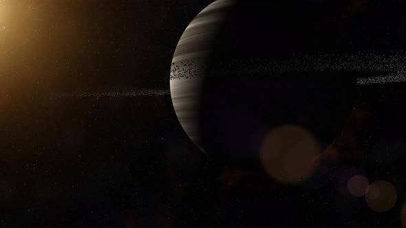 Large Gas Planet With Ring System Of Ice Particles Orbiting Red Star