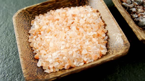 Halite and black salt in bowl 4k alt